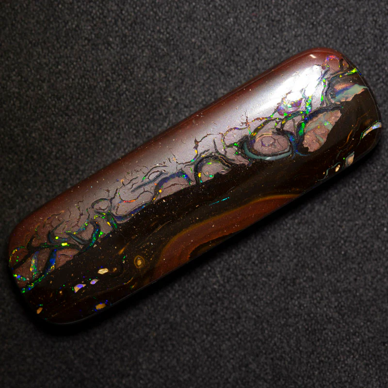 58.73 ct boulder opal 45x13.8x7.4mm