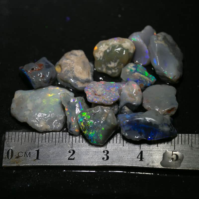 59 ct  14pc rough opal parcel for intermediate cutters