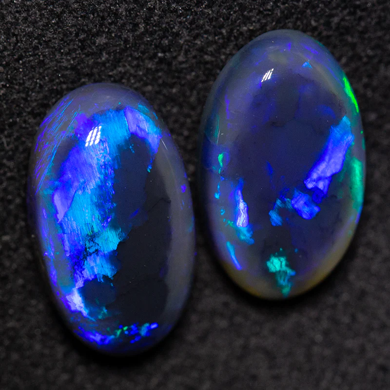 6.01 ct black opal pair 12.5x7.3x5mm