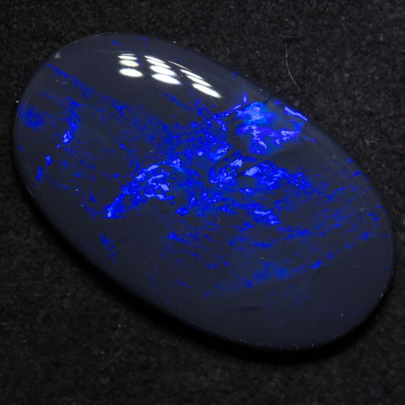 6.06ct black opal 20.4x12.1x3.6mm