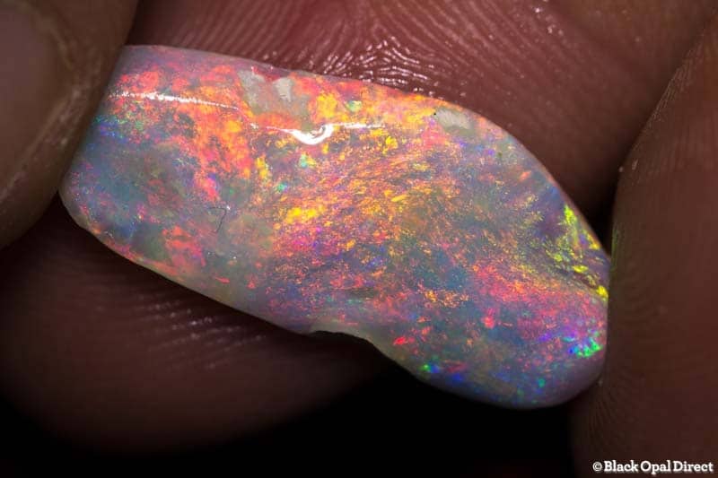 6.07 ct rubbed opal piece 24mm across