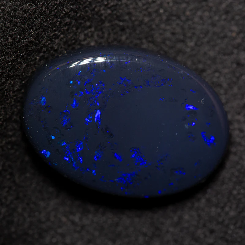 6.15 ct black opal 16.2x11.4x5.1mm