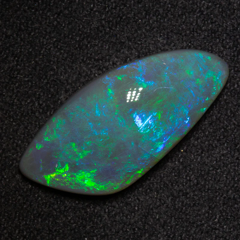 6.19 ct dark opal 21.1x9.6x5.5mm