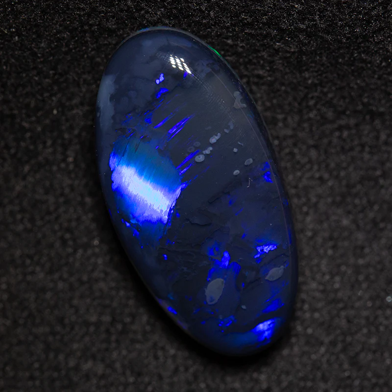 6.28 ct double sided black opal 17.5x8.9x5.7mm