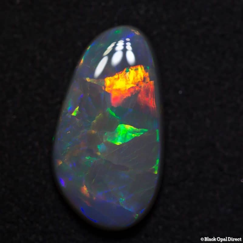 6.30 ct dark opal 19x11x4.5mm