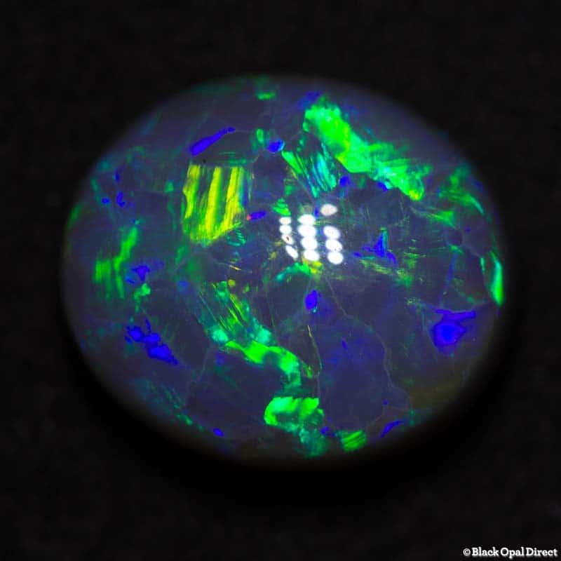 6.39 ct dark opal 13x11.5x6.5mm
