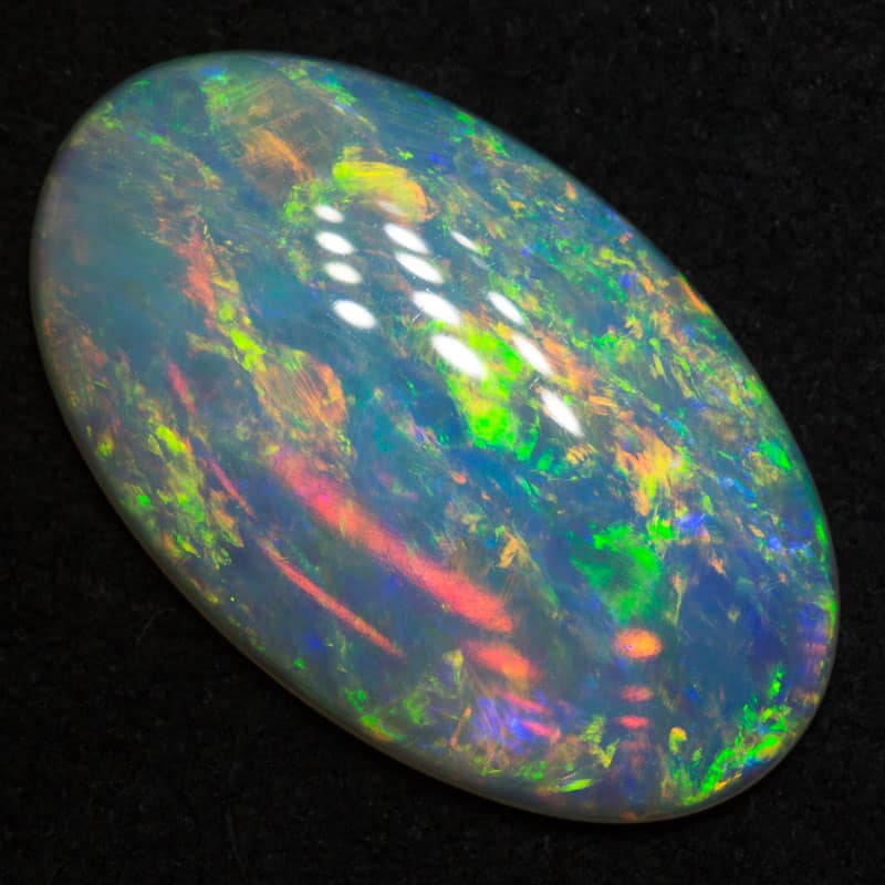 6.56 ct double sided crystal opal 20.8x12.6x3.7mm