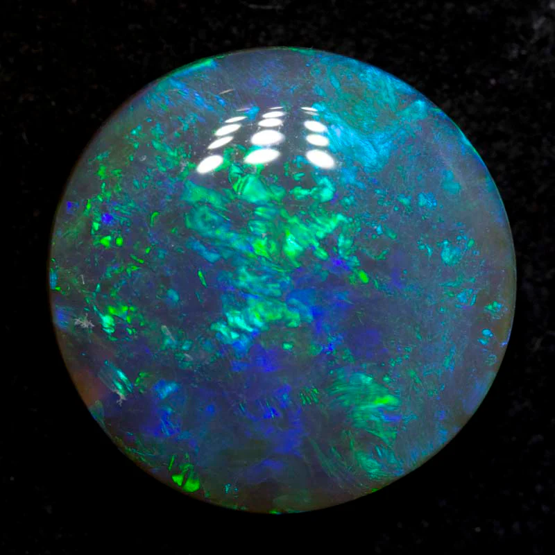 6.60 ct black opal 14.5x14.4x4.8mm