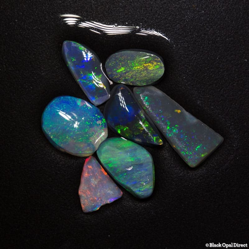6.69 ct opal rubs 7 pieces