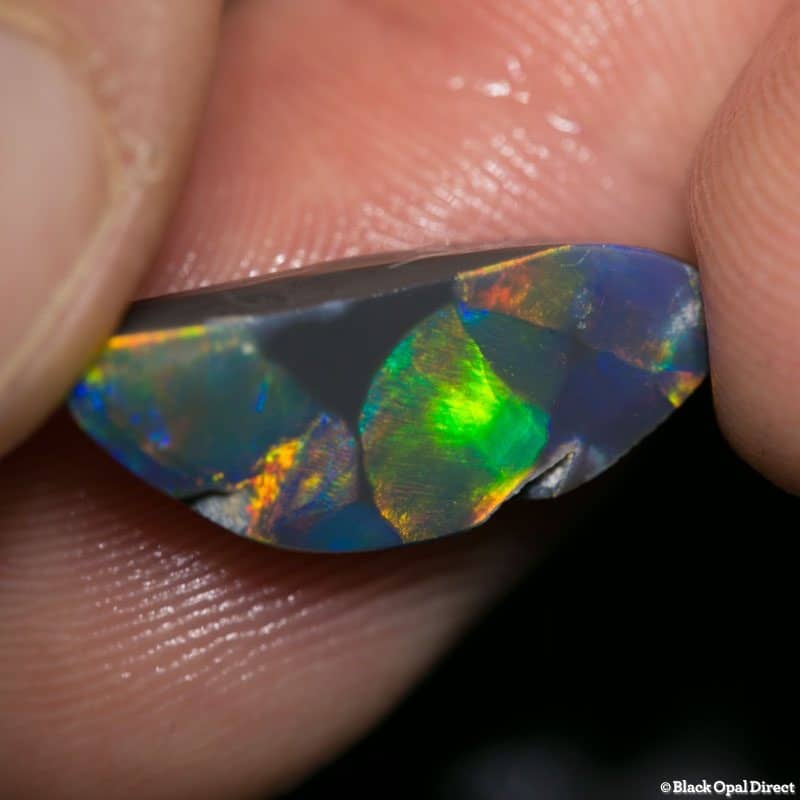 6.79 ct roughly rubbed opal piece 21mm across