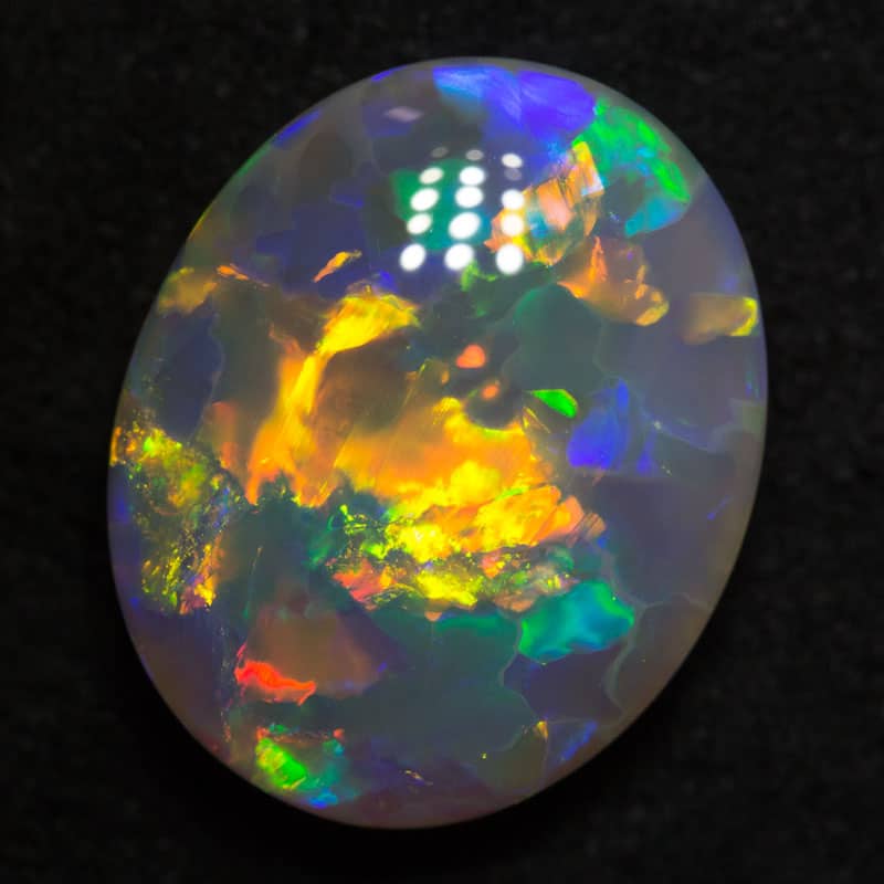 6.86 ct dark opal 15.3x12.4x5.6mm