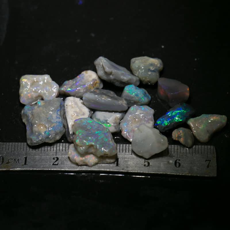 67 ct  17pc rough opal parcel for intermediate cutters