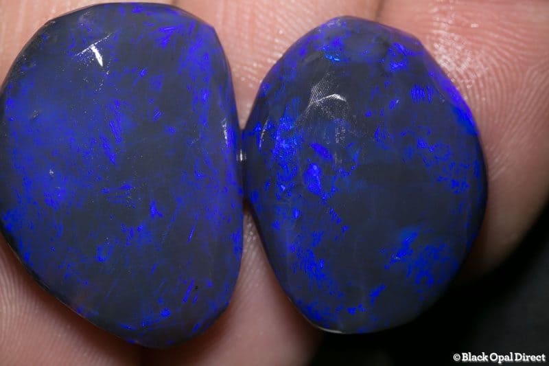 69.75 ct black opal rubs 2 pieces