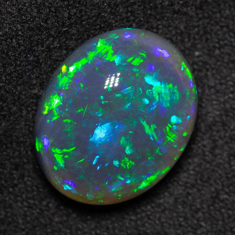 7.06 ct black opal 14x11.5x7.5mm
