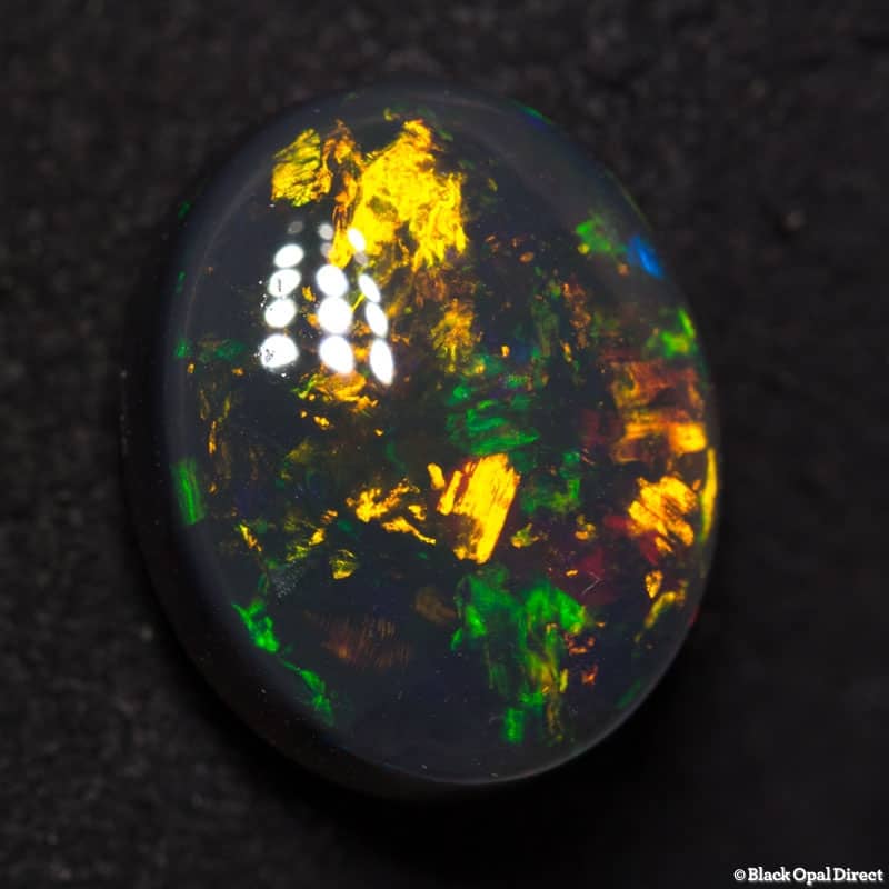 7.35 ct black opal gem 14x12x7mm