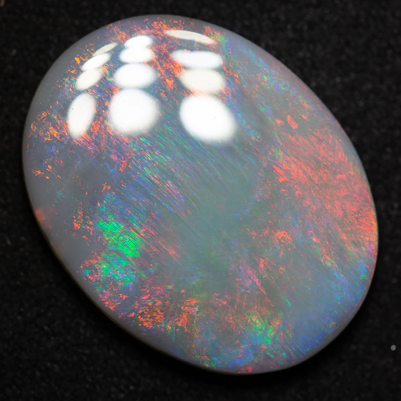 7.90 ct dark opal 20.1x15.6x3.4mm