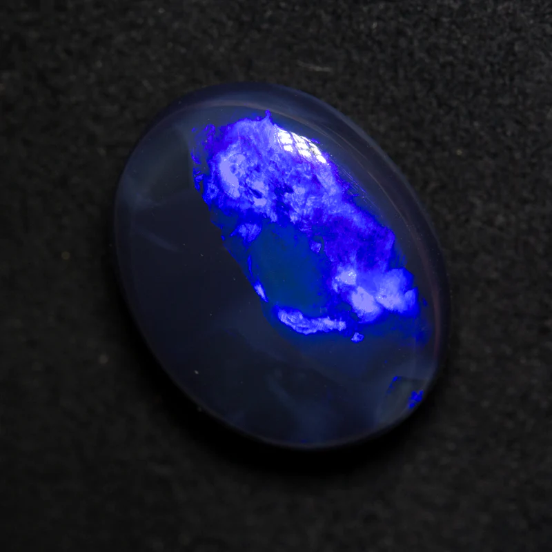 8.00 ct black opal 15.5x12.3x6.7mm
