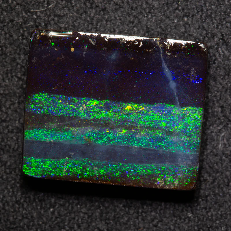 8.09 ct boulder opal 13.5x11.3x4.2mm