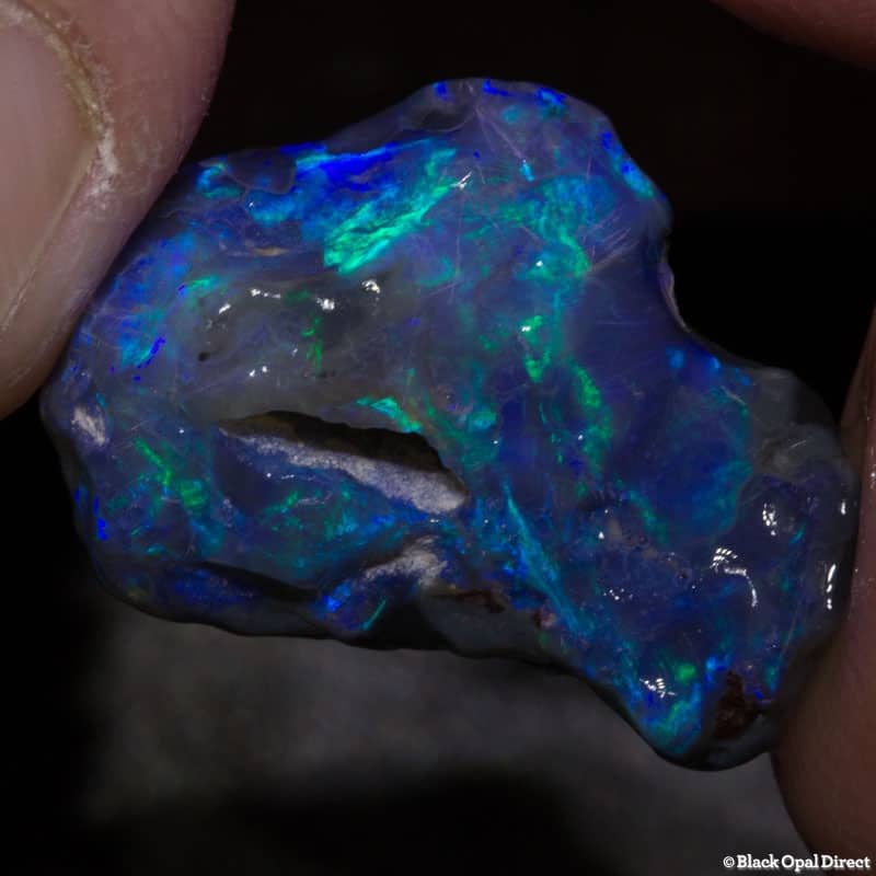 8.68 ct rough opal piece with hole 21mm across