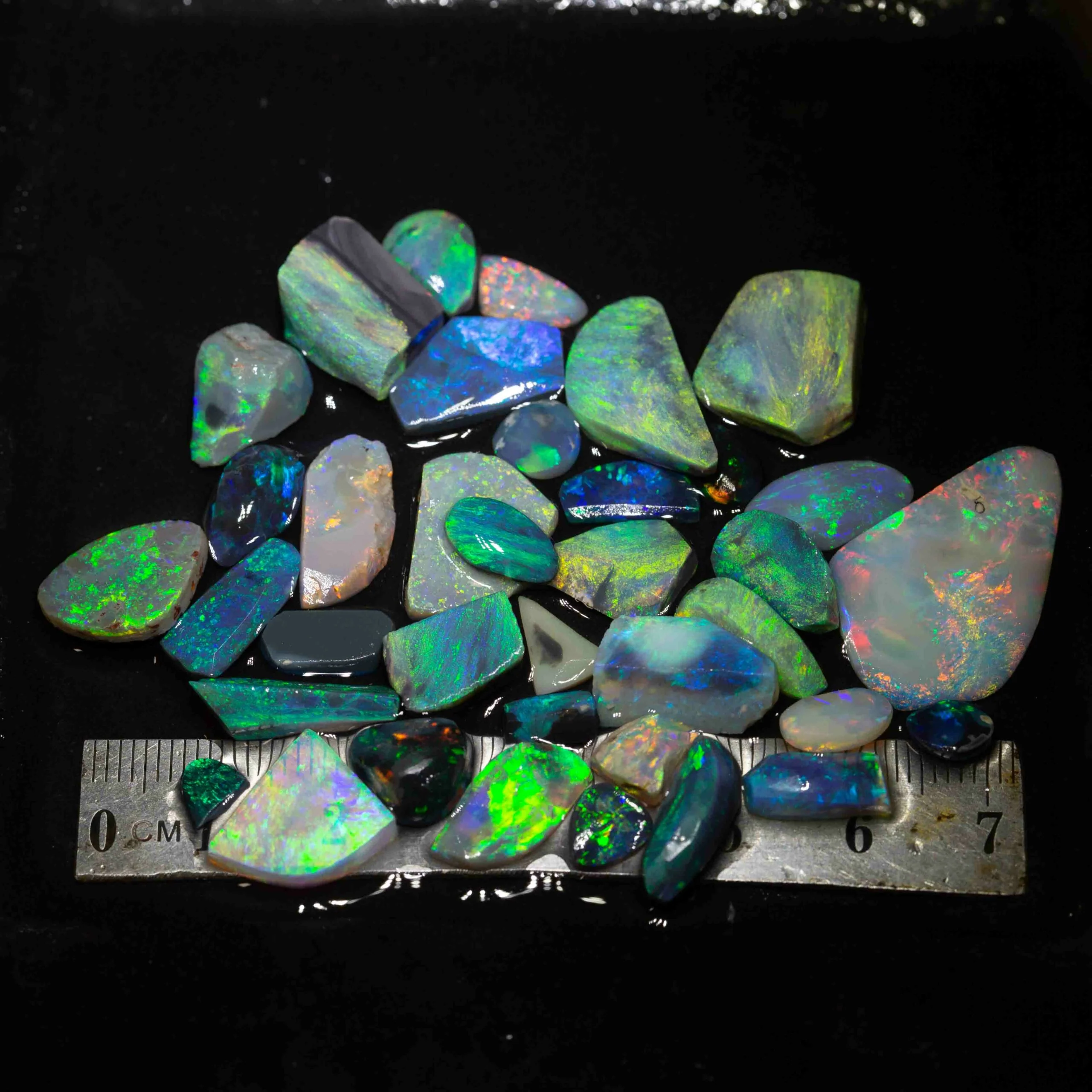 80 ct opal rubs 37 pieces