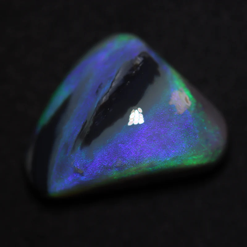 9.17 ct dark opal 17.3x12.9x7.6mm