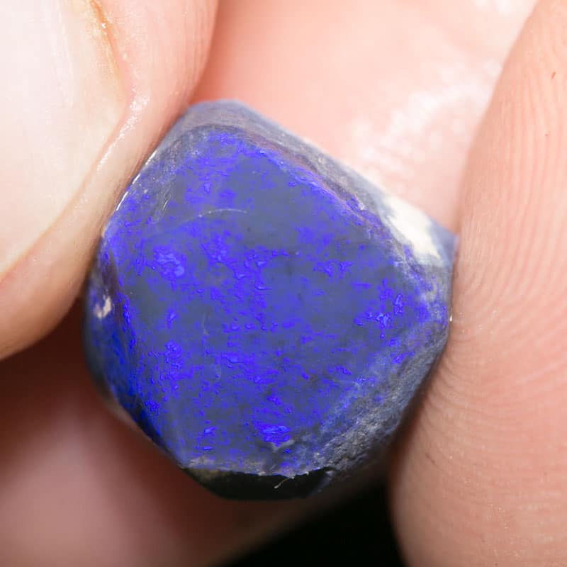 9.29 ct roughly rubbed opal piece 13mm across