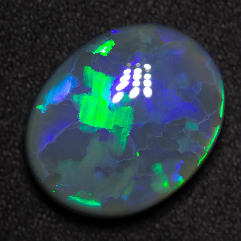 9.32 ct black opal 16.6x13.4x6.4mm