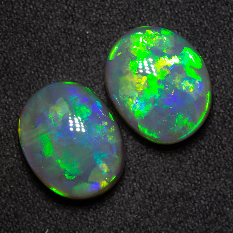 9.67ct gem black opal pair 12x9.8x6.7mm