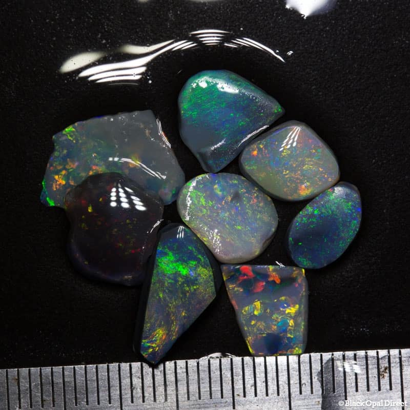 9.74 ct opal rubs 8 pieces