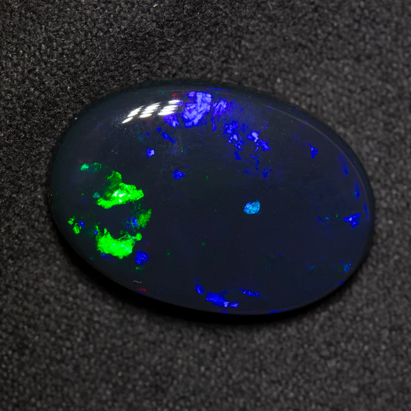 9.82 ct black opal 20.2x13.8x5.2mm