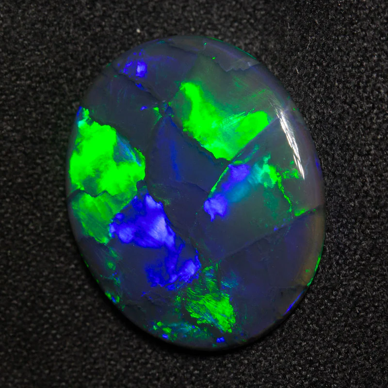 9.87 ct gem black opal 20.6x17.1x4.3mm