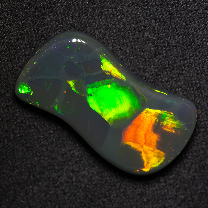 9.89 ct black opal carving 22x12x4.5mm