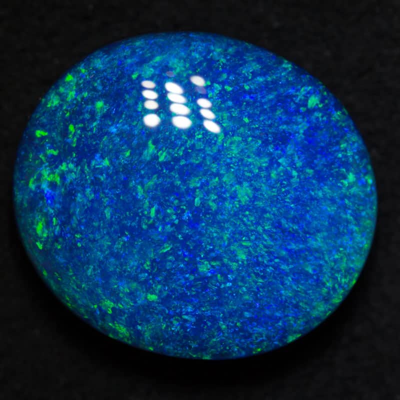 9.94 ct gem black opal 16.4x14.5x6.3mm