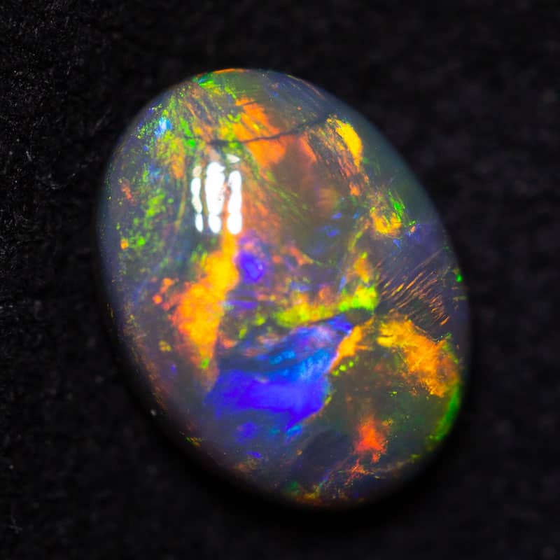 DEPOSIT ONLY 0.81 ct black opal 7x5.5x3mm