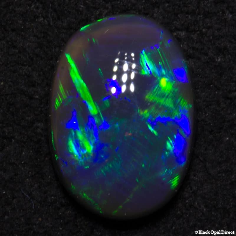 0.84 ct black opal 8x6x3mm